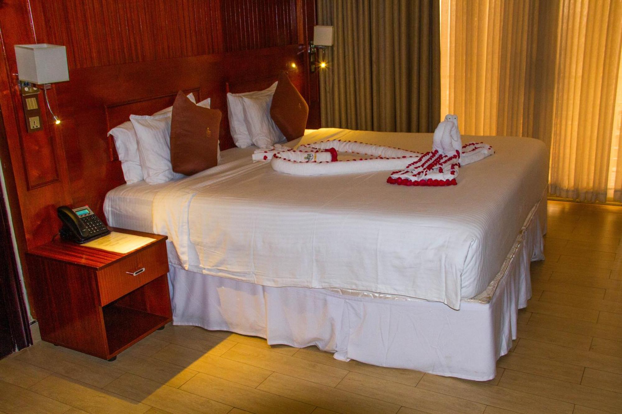 Sainte Famille Hotel Кигали Екстериор снимка