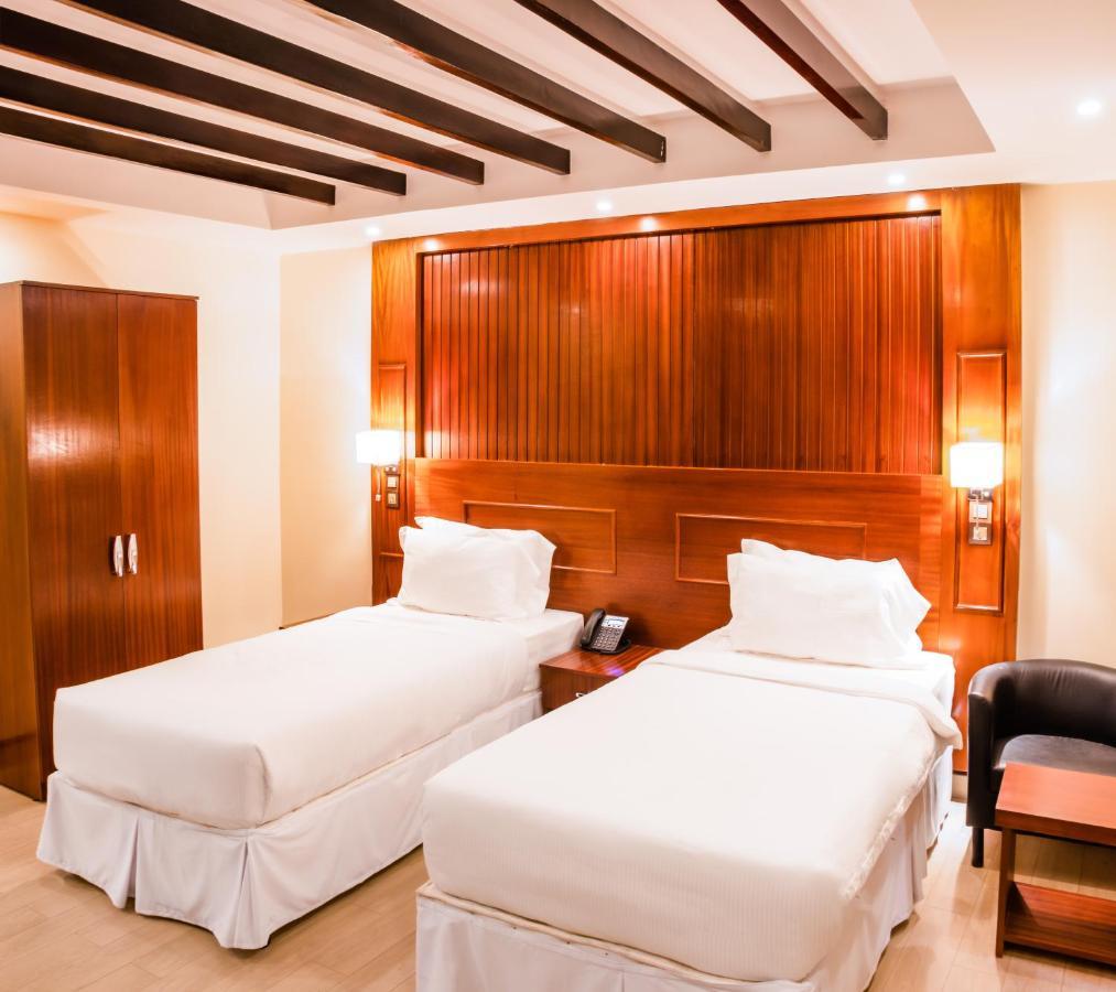 Sainte Famille Hotel Кигали Екстериор снимка